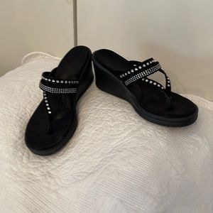 Black wedge flip flops